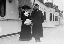 Mary Moore and Sir Chas. Wyndham on boat deck, 1916. Creator: Bain News Service