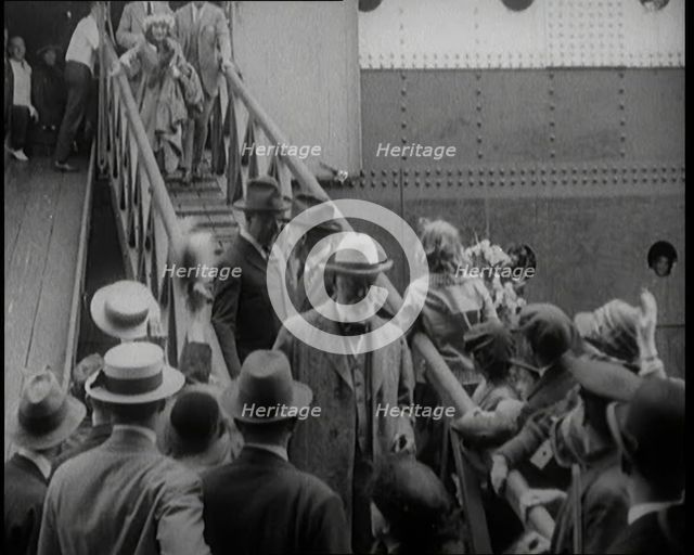 Mary Pickford Walking Down the Gangplank to Disembark from an Ocean Liner in the United Kingdom,1920 Creator: British Pathe Ltd.