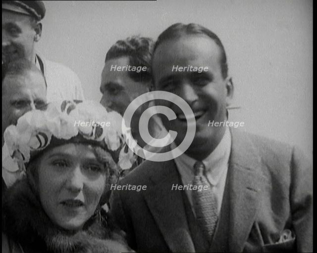 Mary Pickford and Douglas Fairbanks Senior Smiling for the Camera, 1920. Creator: British Pathe Ltd.