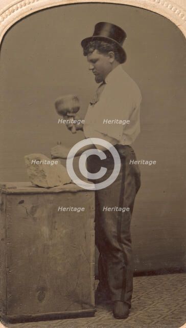 Mason in Top Hat with Mallet, Chisel, and Piece of Stone, 1870s-80s. Creator: J. R. Martin.