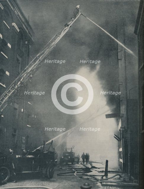 'Massed Forces of the Modern Fire-Fighter Pitted Against a City Blaze', c1935. Artist: Unknown.