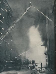 Massed Forces of the Modern Fire-Fighter Pitted Against a City Blaze c1935