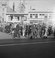 Mass meeting of WPA workers parading up Market Street, San Francisco, California , 1939. Creator: Dorothea Lange