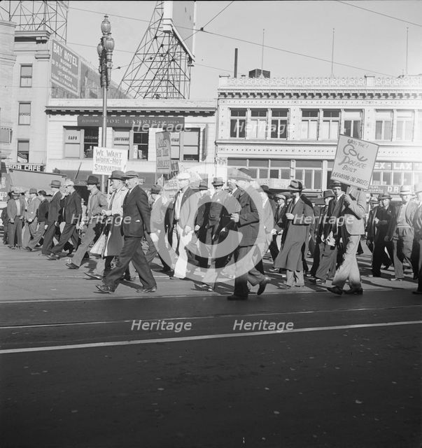 Mass meeting of WPA workers parading up Market Street, San Francisco, California , 1939. Creator: Dorothea Lange.