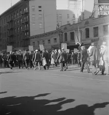 Mass meeting of WPA workers parading up Market Street, San Francisco, California , 1939. Creator: Dorothea Lange