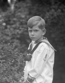 McCormick, Medill, child of, standing outdoors, 1923 May 21. Creator: Arnold Genthe
