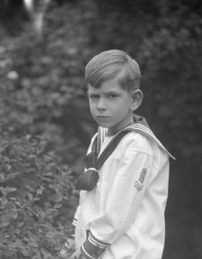 McCormick, Medill, child of, standing outdoors, 1923 May 21. Creator: Arnold Genthe