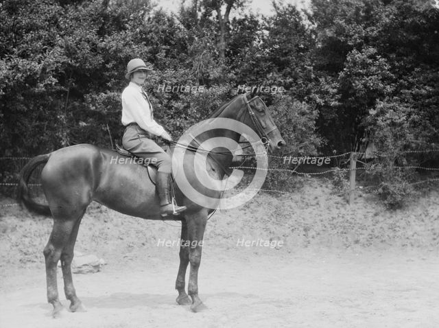 McCulloch, Mrs., daughter of, on horseback, 1929 June 13. Creator: Arnold Genthe.