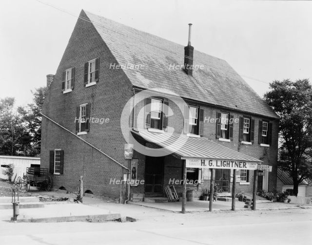 McDuff Green Warehouse in Falmouth, Stafford County, Virginia--H.G. Lightner store, c1927 - 1943. Creator: Frances Benjamin Johnston.