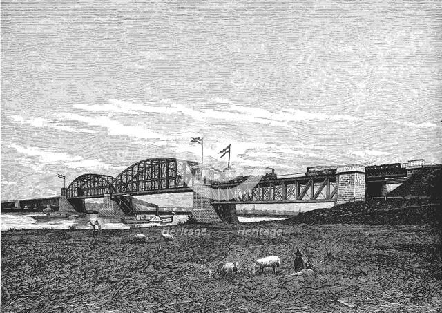 Metal bridge for railway over the Rhine river near Arnhem, engraving 1879.