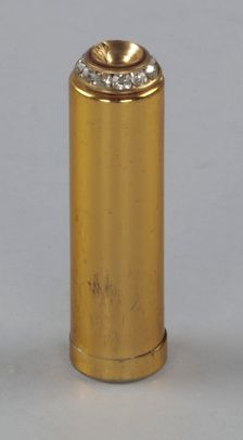 Metal lipstick holder from Mae's Millinery Shop, 1941-1994. Creator: Unknown
