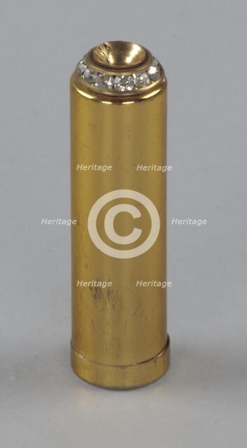 Metal lipstick holder from Mae's Millinery Shop, 1941-1994. Creator: Unknown.