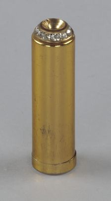 Metal lipstick holder from Mae's Millinery Shop, 1941-1994. Creator: Unknown