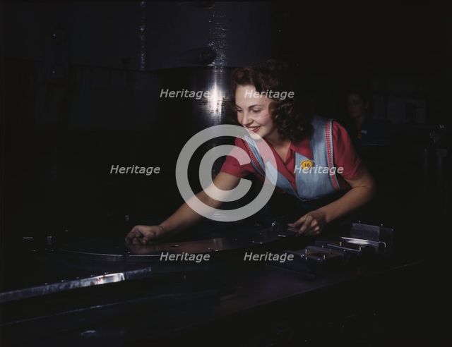 Metal parts are placed on masonite by..., North American Aviation, Inc., Inglewood, Calif., 1942. Creator: Alfred T Palmer.
