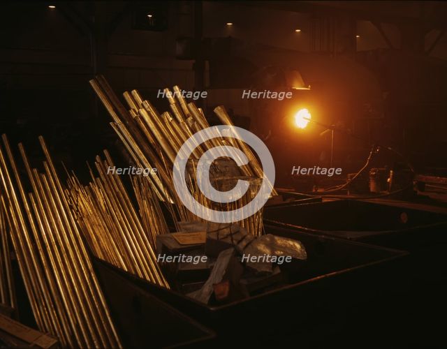 Metal tubing at the Consolidated Aircraft Corp. plant, Fort Worth, Texas, 1942. Creator: Howard Hollem.