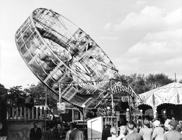 'Meteorite' ride, Goose Fair, Forest Recreation Ground, Nottingham, Nottinghamshire, 1961. Artist: George L Roberts