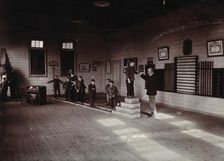Metropolitan Lunatic Asylum, Kew, Victoria (Australia): boys walking along a ladder laid upon... Creator: Unknown