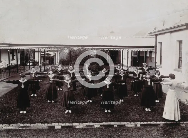 Metropolitan Lunatic Asylum, Kew, Victoria, Australia: female patients exercising, c1890s.. Creator: Unknown.