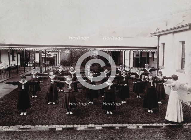 Metropolitan Lunatic Asylum, Kew, Victoria, Australia: female patients exercising, c1890s.. Creator: Unknown.
