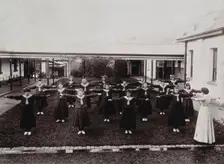 Metropolitan Lunatic Asylum, Kew, Victoria, Australia: female patients exercising, c1890s.. Creator: Unknown