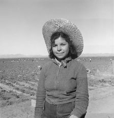 Mexican girl who picks peas for the eastern market, Imperial Valley, California, 1939. Creator: Dorothea Lange