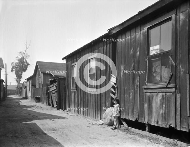 Mexican quarter of Los Angeles, one quarter mile from City Hall, 1936. Creator: Dorothea Lange.