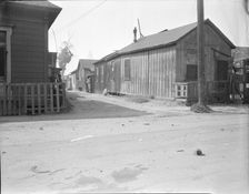Mexican quarter of Los Angeles, one quarter mile from City Hall, California, 1936. Creator: Dorothea Lange