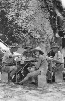 Meal time, Livingstone to Broken Hill, Northern Rhodesia, 1925 (1927). Artist: Thomas A Glover