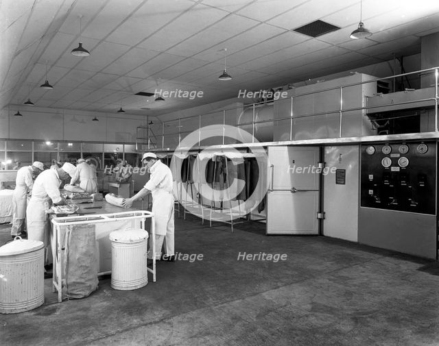 Meat dressing at the Danish Bacon Co, Kilnhurst, South Yorkshire, 1957.  Creator: Michael Walters.