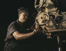 Mechanical operator on boiler parts, Combustion Engineering Co., Chattanooga, Tenn., 1942. Creator: Alfred T Palmer