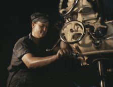 Mechanical operator on boiler parts, Combustion Engineering Co., Chattanooga, Tenn., 1942. Creator: Alfred T Palmer