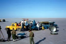 Mechanics fuelling Bluebird CN7 for World Land Speed Record attempt, Lake Eyre, 1964. Creator: Unknown