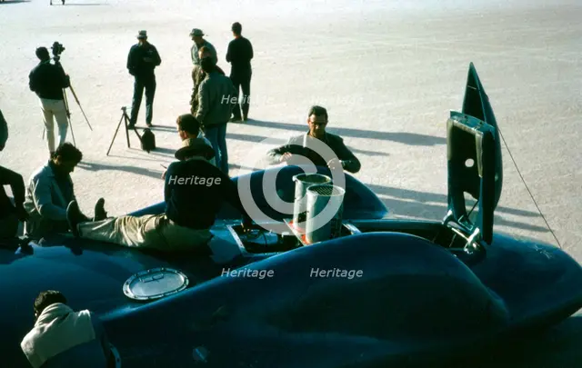 Mechanics working on Bluebird CN7 at lake Eyre for World Land speed record attempt, 1964. Creator: Unknown.