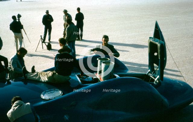 Mechanics working on Bluebird CN7 at lake Eyre for World Land speed record attempt, 1964. Creator: Unknown.