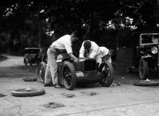 Mechanics working on Leon Cushman's Austin 7 racer for a speed record attempt, Brooklands, 1931. Artist: Bill Brunell