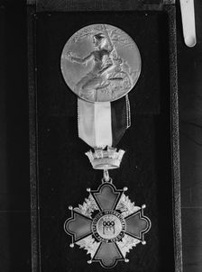 Medal from the 1928 Exposition internationale in Paris, between 1928 and 1942. Creator: Arnold Genthe
