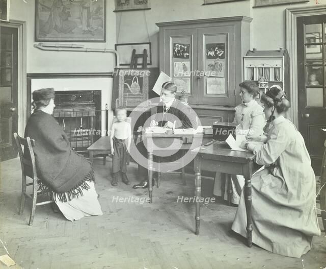 Medical examination of a boy, Holland Street School, London, 1911. Artist: Unknown.