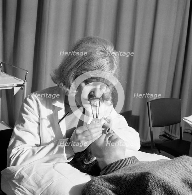 Medical eye checks, Rotherham General Infirmary, 1967. Creator: Michael Walters.