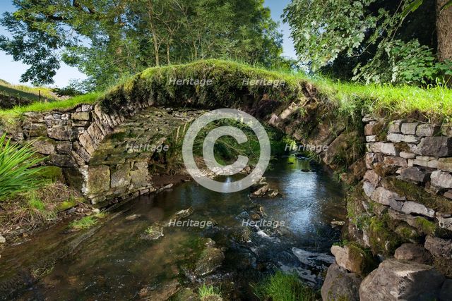 Medieval packhorse bridge, Fawcett Mill Fields, Gaisgill, Tebay, Cumbria, c2016. Artist: Alun Bull.