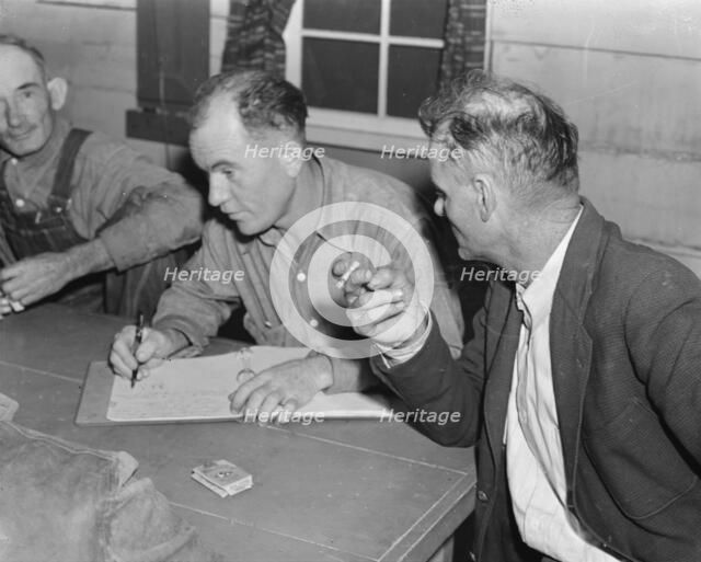Meeting of the camp council, FSA camp, Farmersville, California, 1939. Creator: Dorothea Lange.