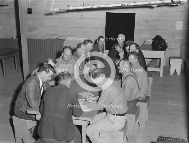Meeting of the camp council, FSA camp, Farmersville, California, 1939. Creator: Dorothea Lange.