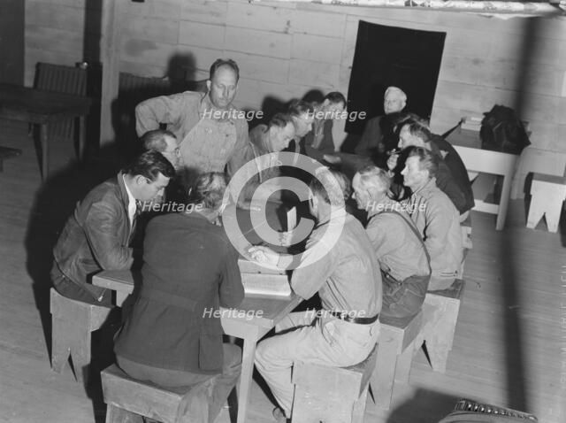 Meeting of the camp council, FSA camp, Farmersville, California, 1939. Creator: Dorothea Lange.