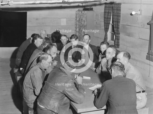 Meeting of the camp council, FSA camp, Farmersville, California, 1939. Creator: Dorothea Lange.