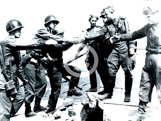 Meeting of American and Russian soldiers near Torgau, Germany, World War II, 25 April 1945. Creator: Unknown.