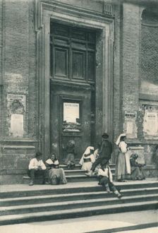 Meeting place of artists models in front of a church in the Via Babuino, Rome, Italy, 1927. Artist: Eugen Poppel