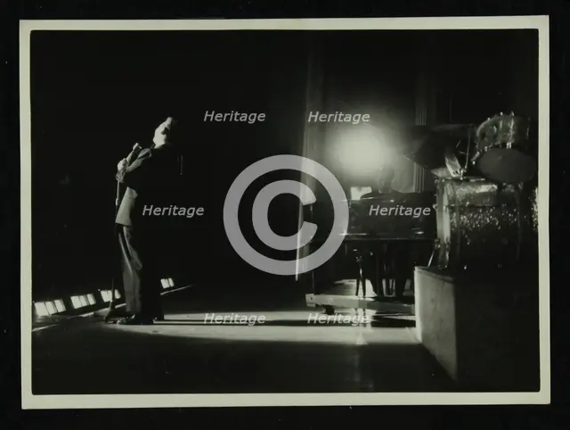Mel Torme (vocals) in concert at the Bristol Hippodrome, 1950s. Creator: Denis Williams.