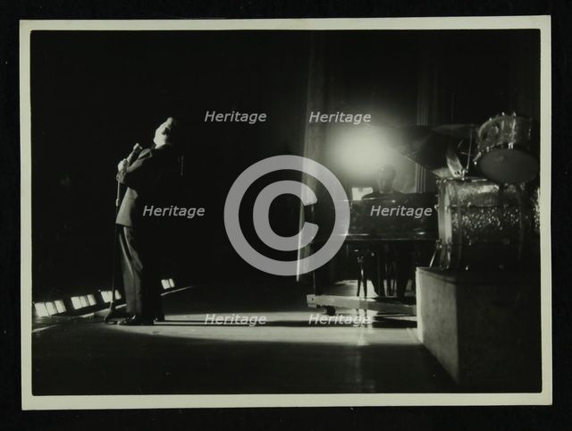 Mel Torme (vocals) in concert at the Bristol Hippodrome, 1950s. Creator: Denis Williams.