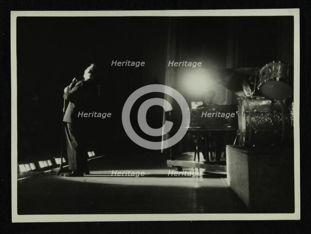 Mel Torme (vocals) in concert at the Bristol Hippodrome, 1950s. Artist: Denis Williams