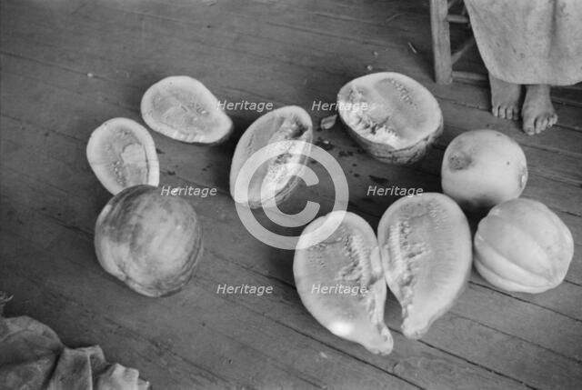 Melons on Frank Tengle's porch. Hale County, Alabama, 1936. Creator: Walker Evans.