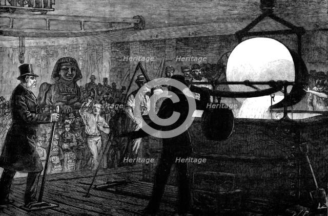 Melting the metal for the bronze Sphinx to be placed on the Thames Embankment, 1881. Creator: William James Palmer.